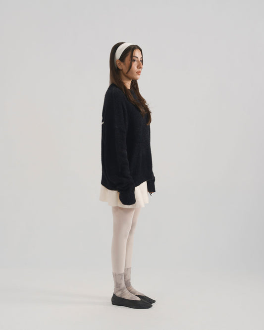 UNTAMED KNIT SWEATER